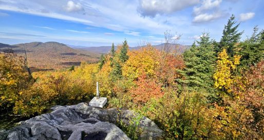 The long trail northern terminus monument marker beteeen the US and Canada.